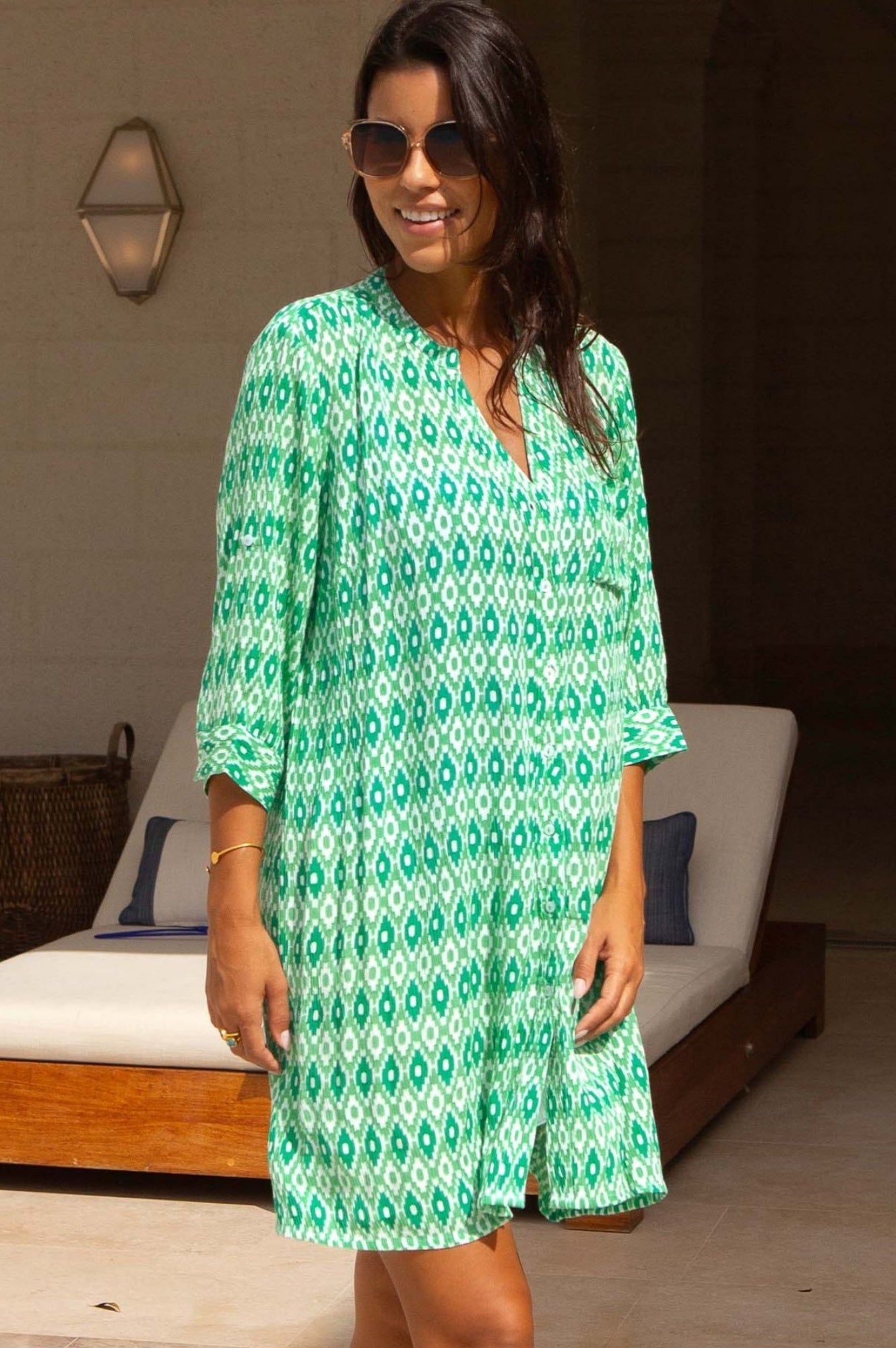Emerald green geometric print shirt dress.