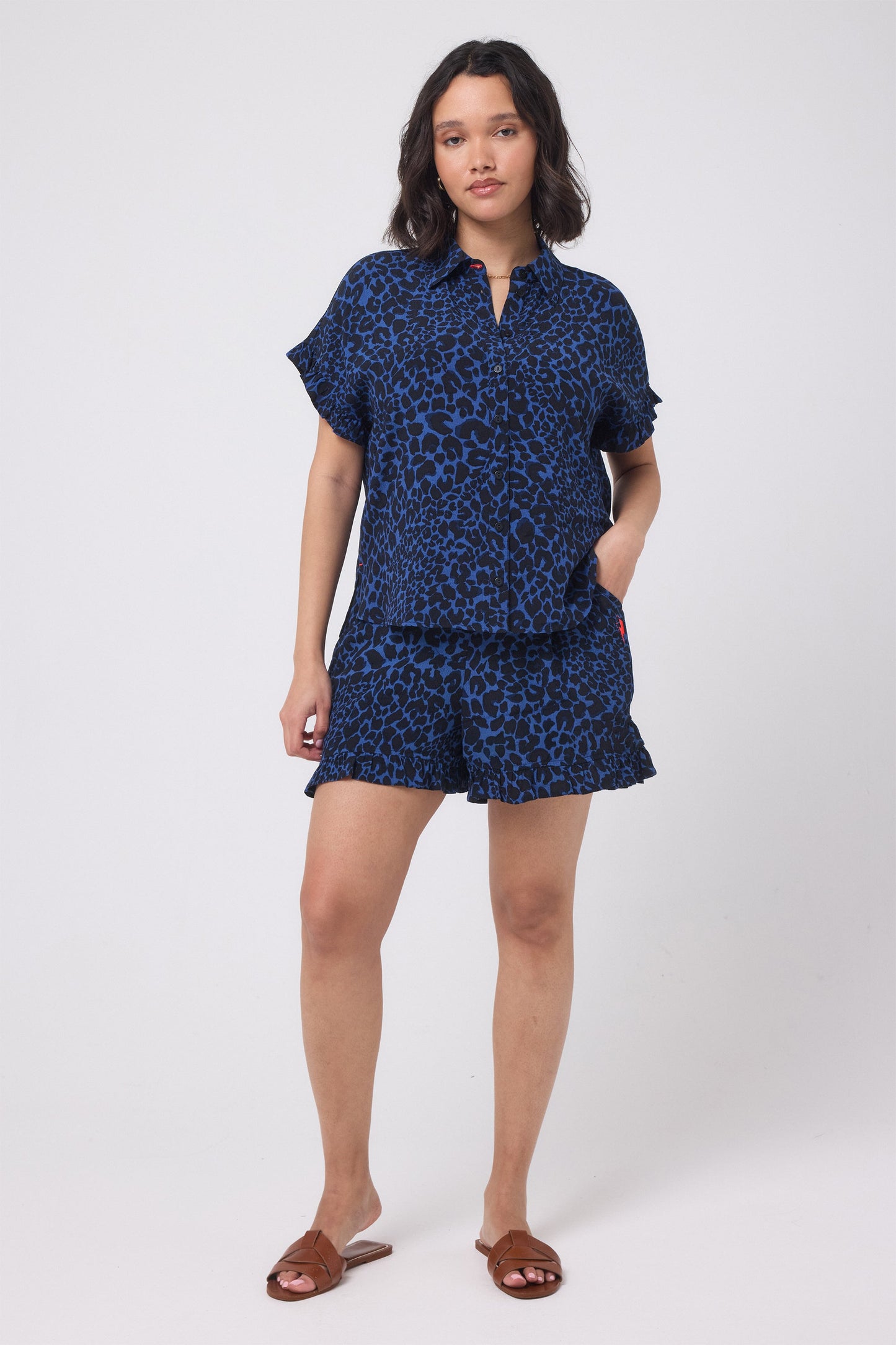 Navy leopard print short sleeve shirt.