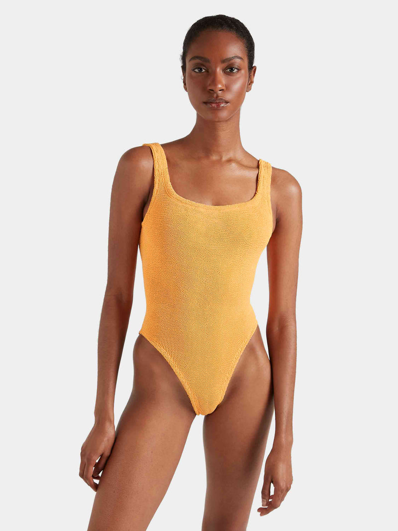 Yellow-orange square neck crinkle cut swimsuit.
