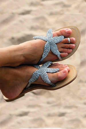 Silver beaded starfish leather sandals.