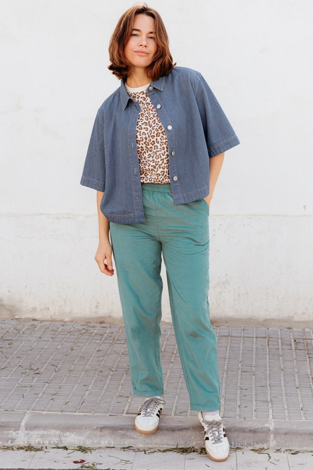100% cotton soft teal cord trousers with tapered leg and elasticated waist.