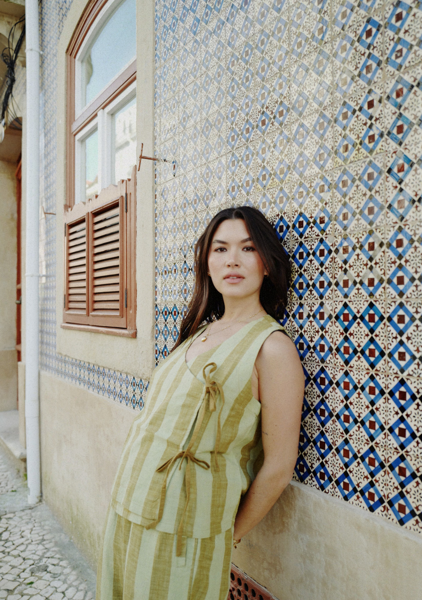 Soft sage and olive striped cotton vest top.