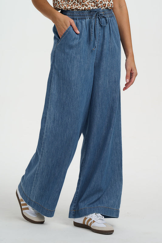 Wide leg denim trousers with elasticated waist, by Sugarhill Brighton.