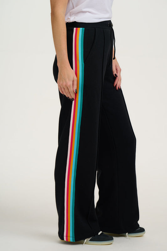 Black 100% cotton jogging bottoms, with rainbow trim along side of legs.