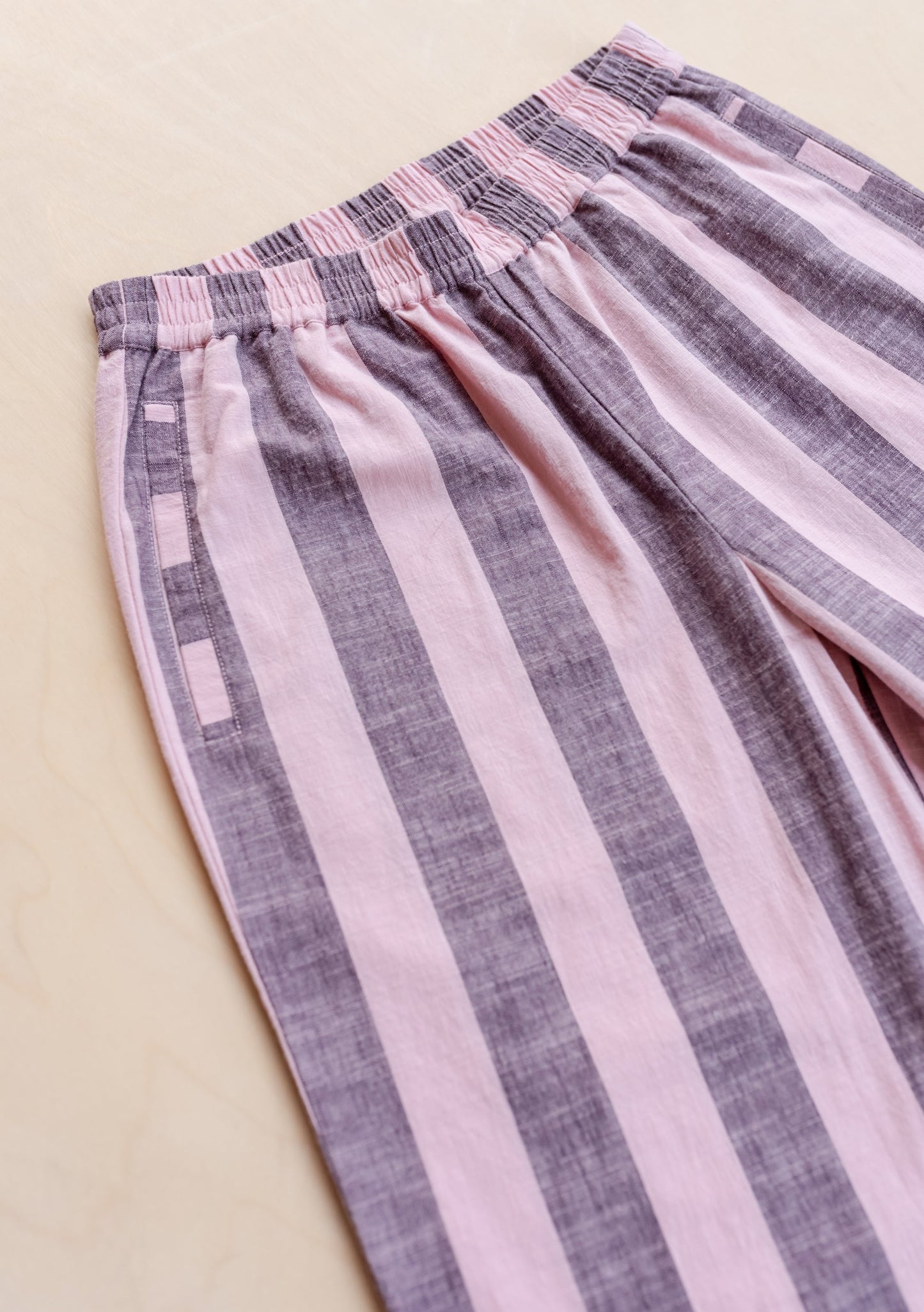 Lilac and cool soft pink stripe cotton poplin trousers in a relaxed fit.