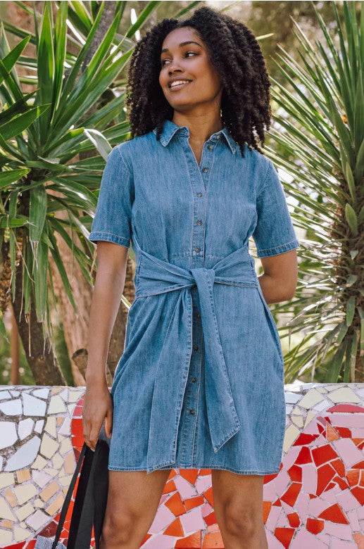 Mid-blue denim shirt dress with belted waist.