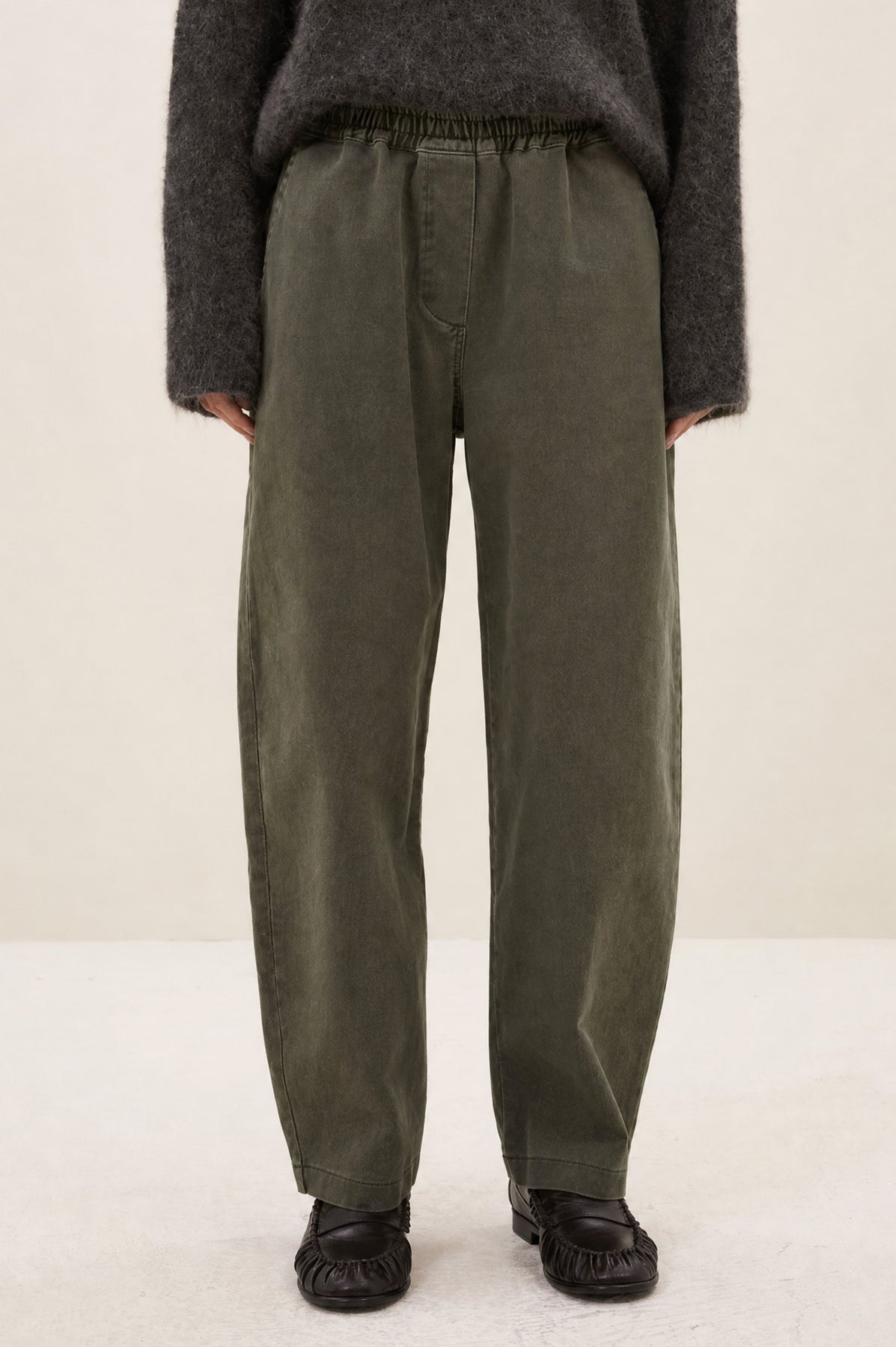 Olive barrel leg trousers with elasticated waist.