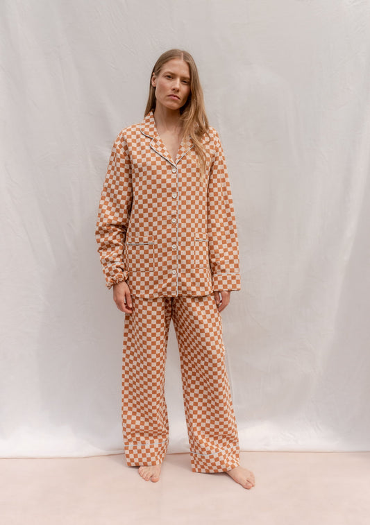 Warm orange checkerboard pyjama set.