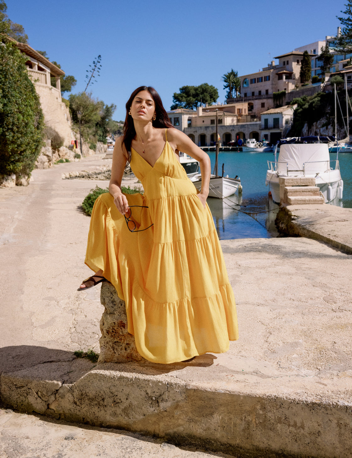 Bright yellow midi dress with straps.