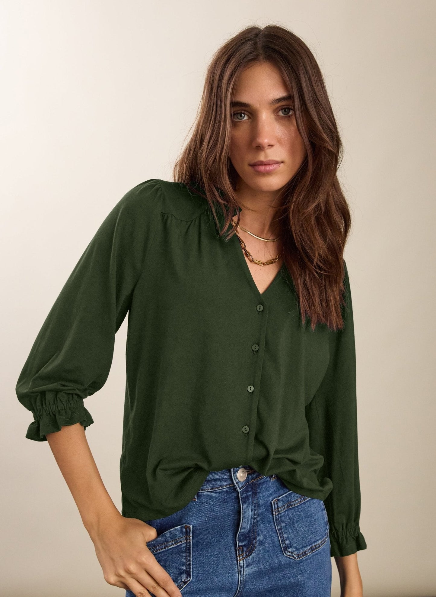 Rich forest green khaki ruffle sleeve blouse.