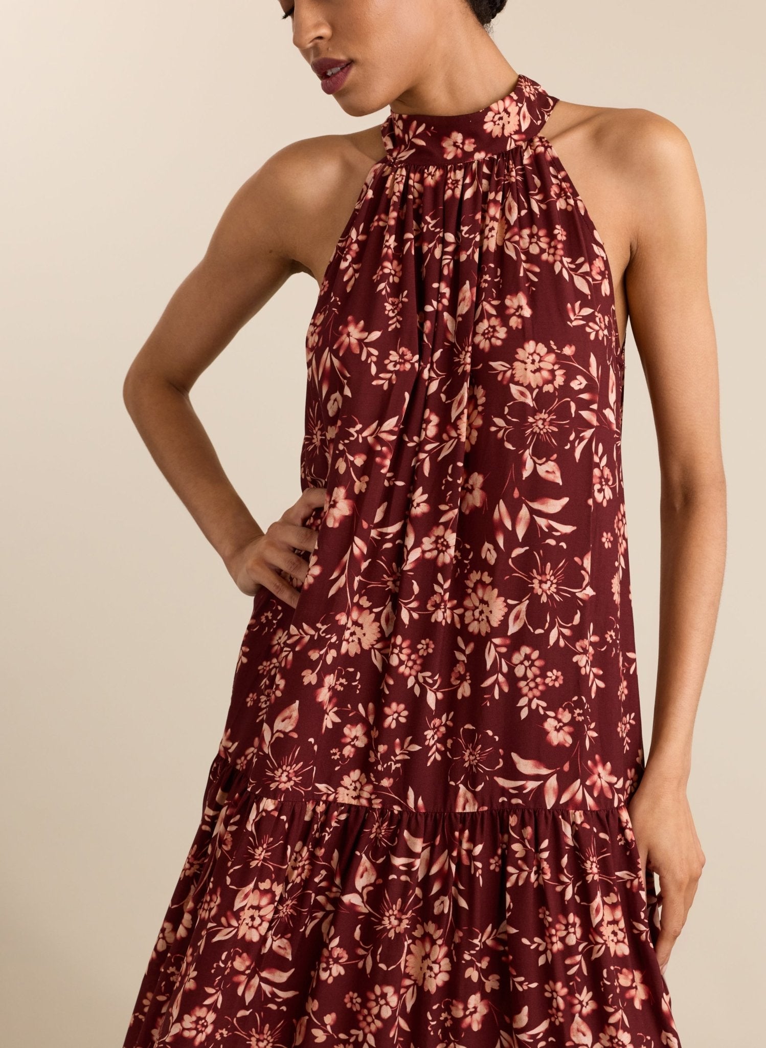 Floral burgundy halterneck maxi dress.