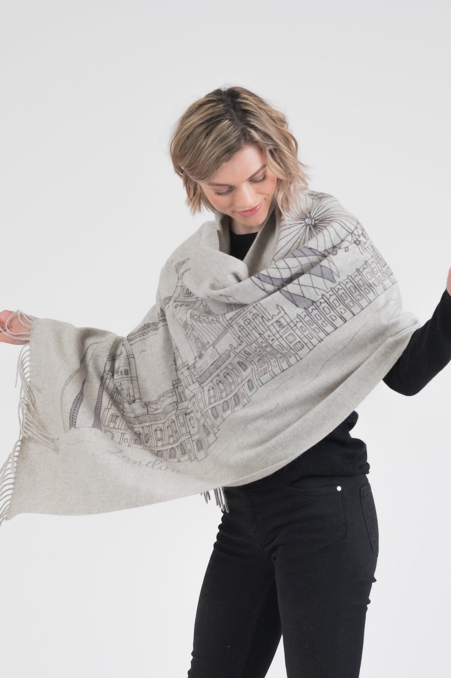 Grey cashmere shawl with City of London skyline pattern.