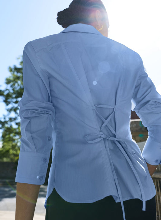 Cinched waist organic cotton shirt in cornflower blue.