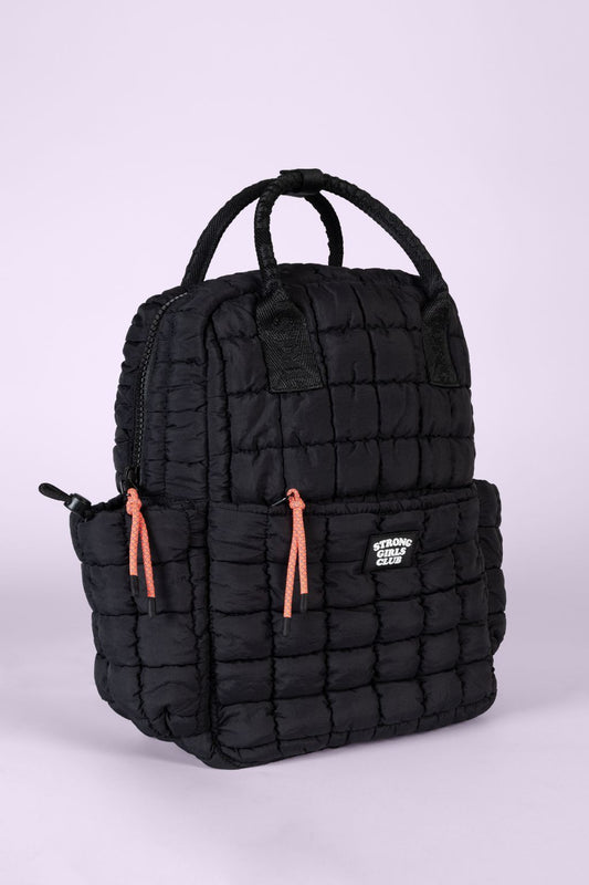 Black quilted backpack with Strong Girls Club logo.