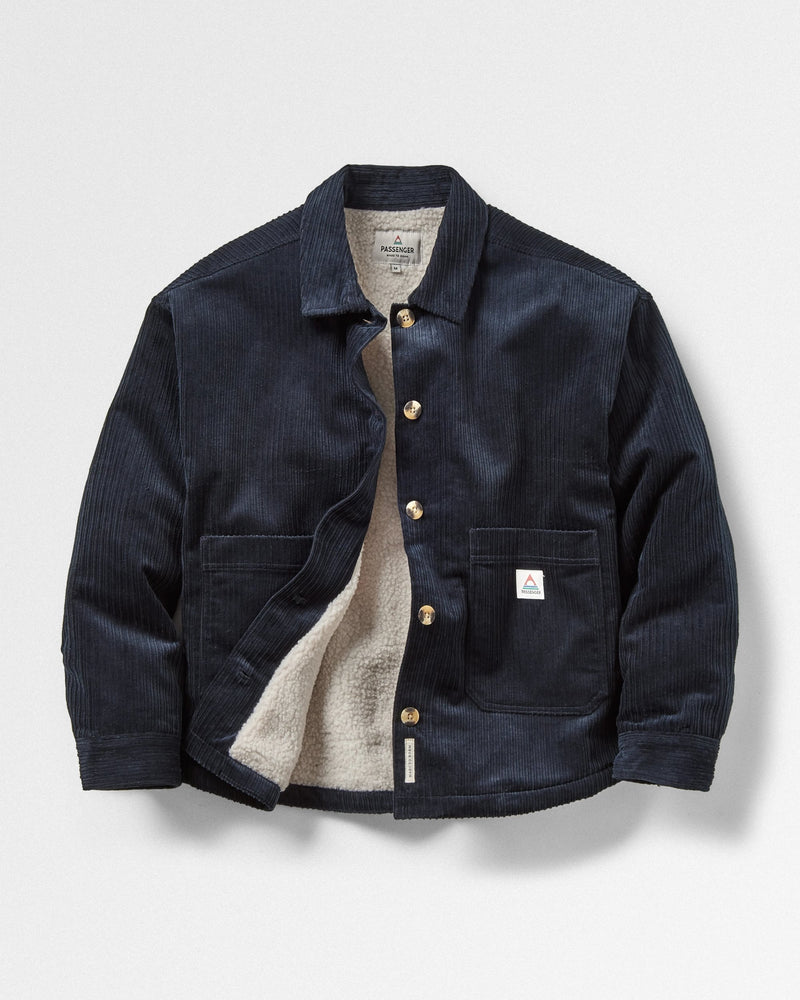 Navy corduroy overshirt with cream fleece lining.