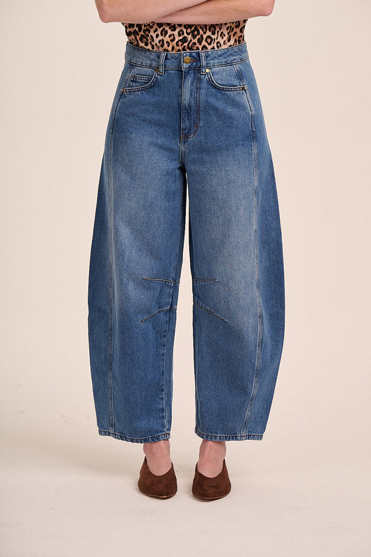 Wide leg blue jeans in mid wash denim.