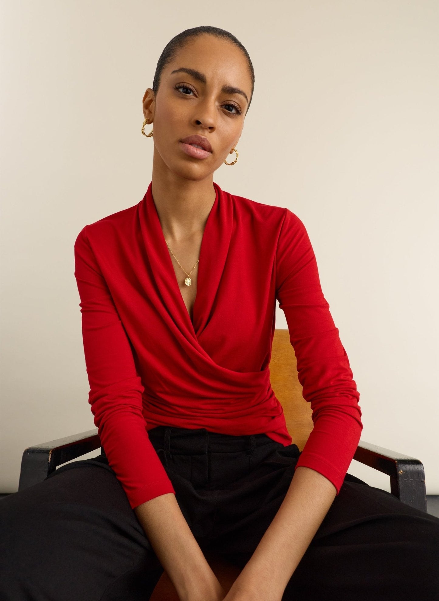 Crimson red jersey wrap top.