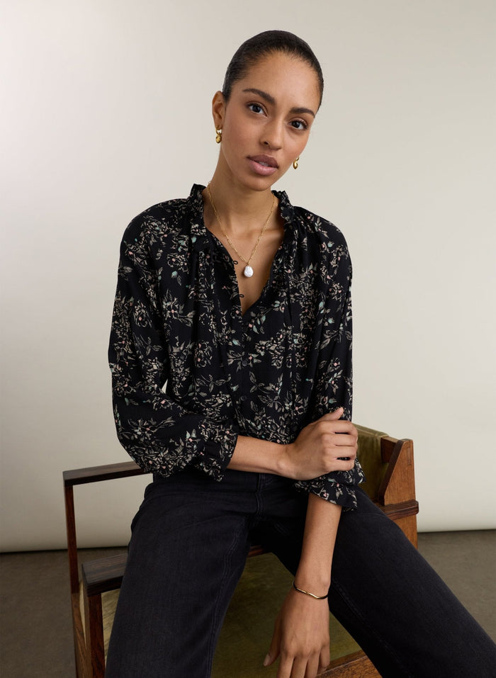 Black floral print viscose blouse.