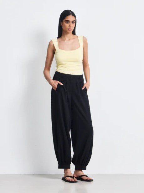 Black Tencel balloon leg trousers.
