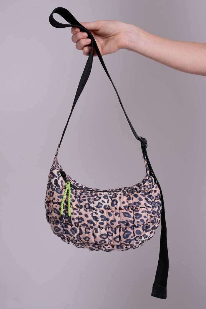 Small pale pink leopard print quilted cross body bag by MuthaHood UK.