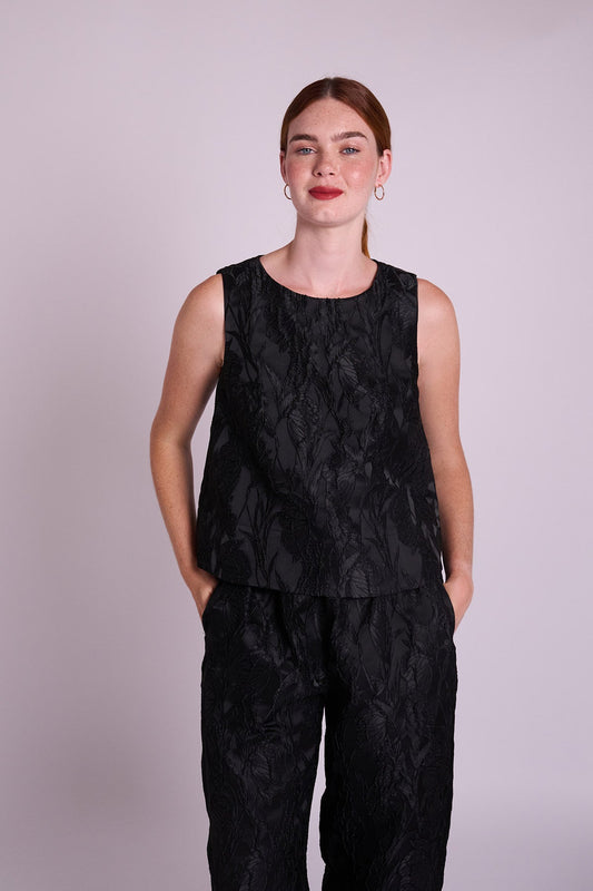 Black jacquard sleeveless top.