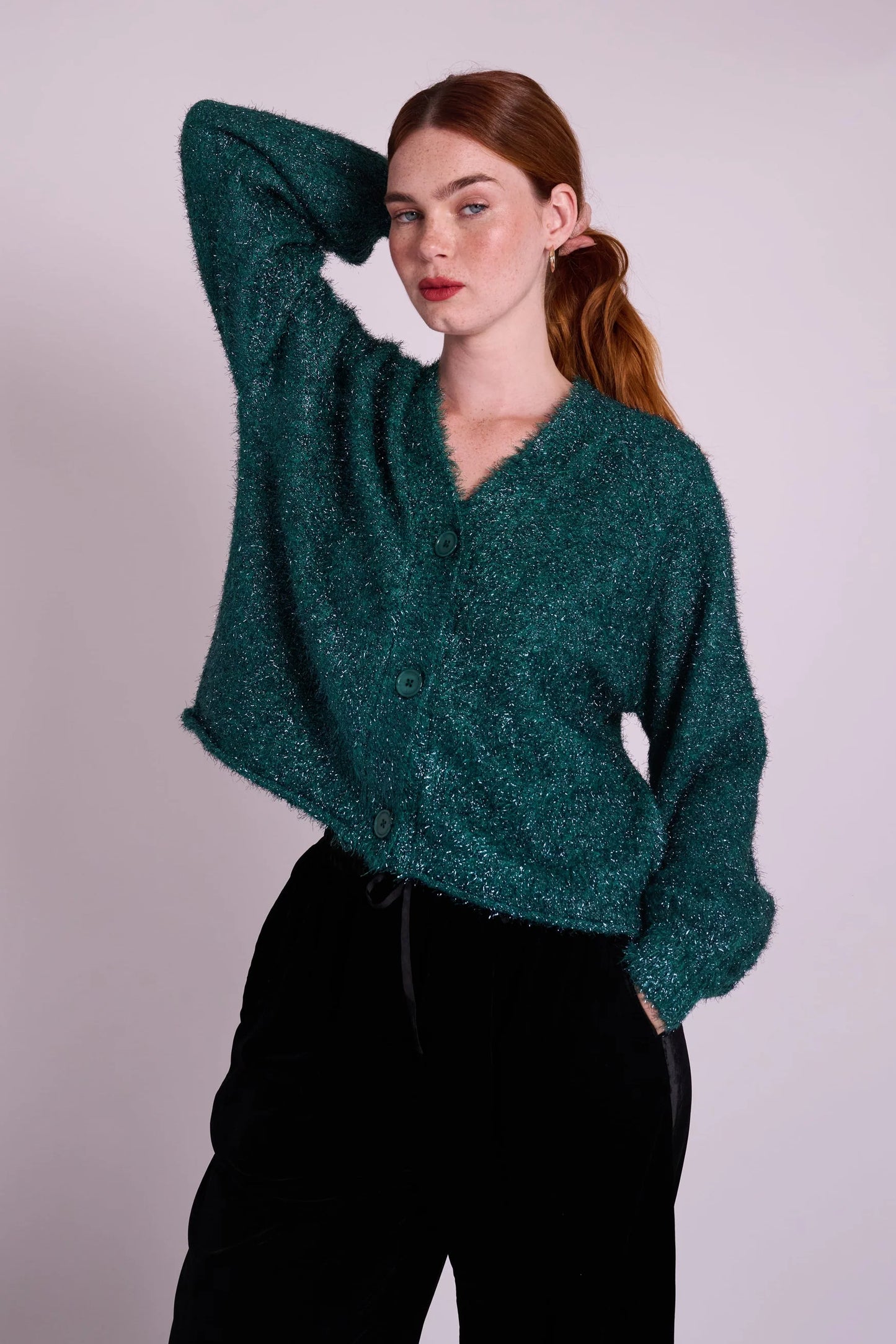 Emerald green sparkly V neck cardigan by MuthaHood UK.