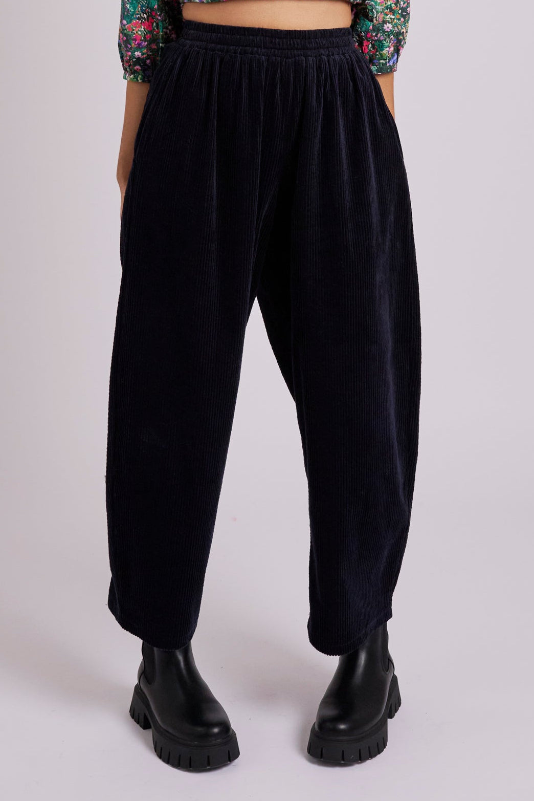 Navy corduroy trousers.