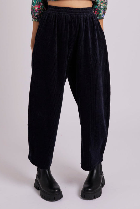 Navy corduroy trousers.