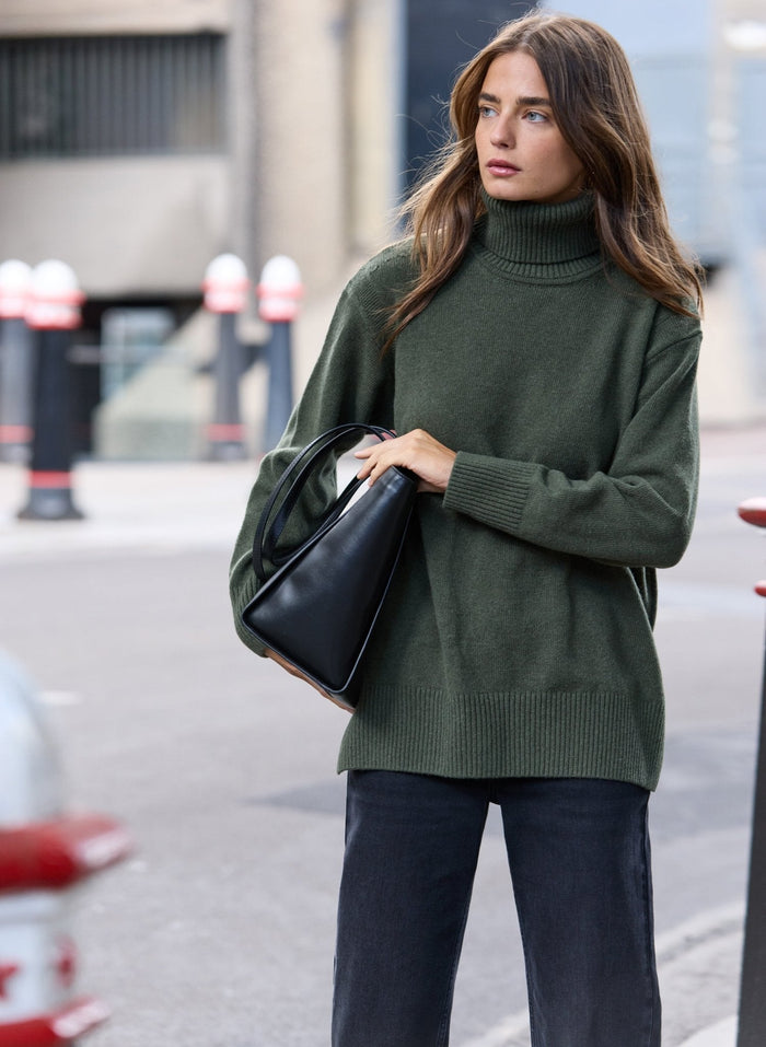 Recycled wool and cashmere longline green knitted polo jumper.