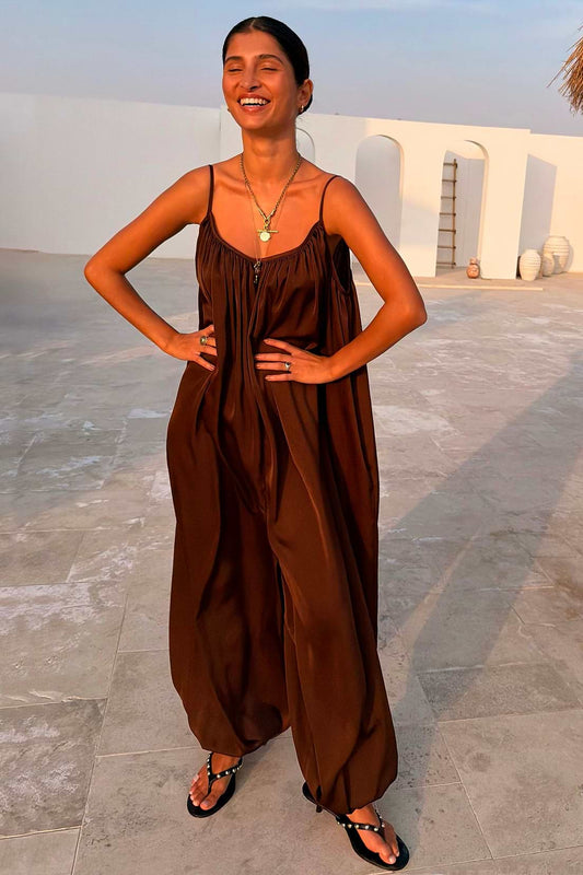 Dark brown balloon jumpsuit with thin straps.