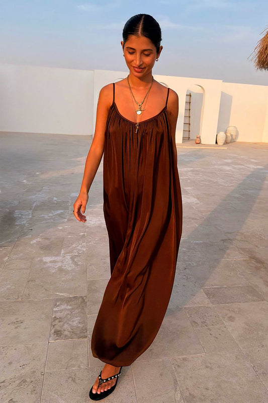 Dark brown balloon jumpsuit with thin straps.