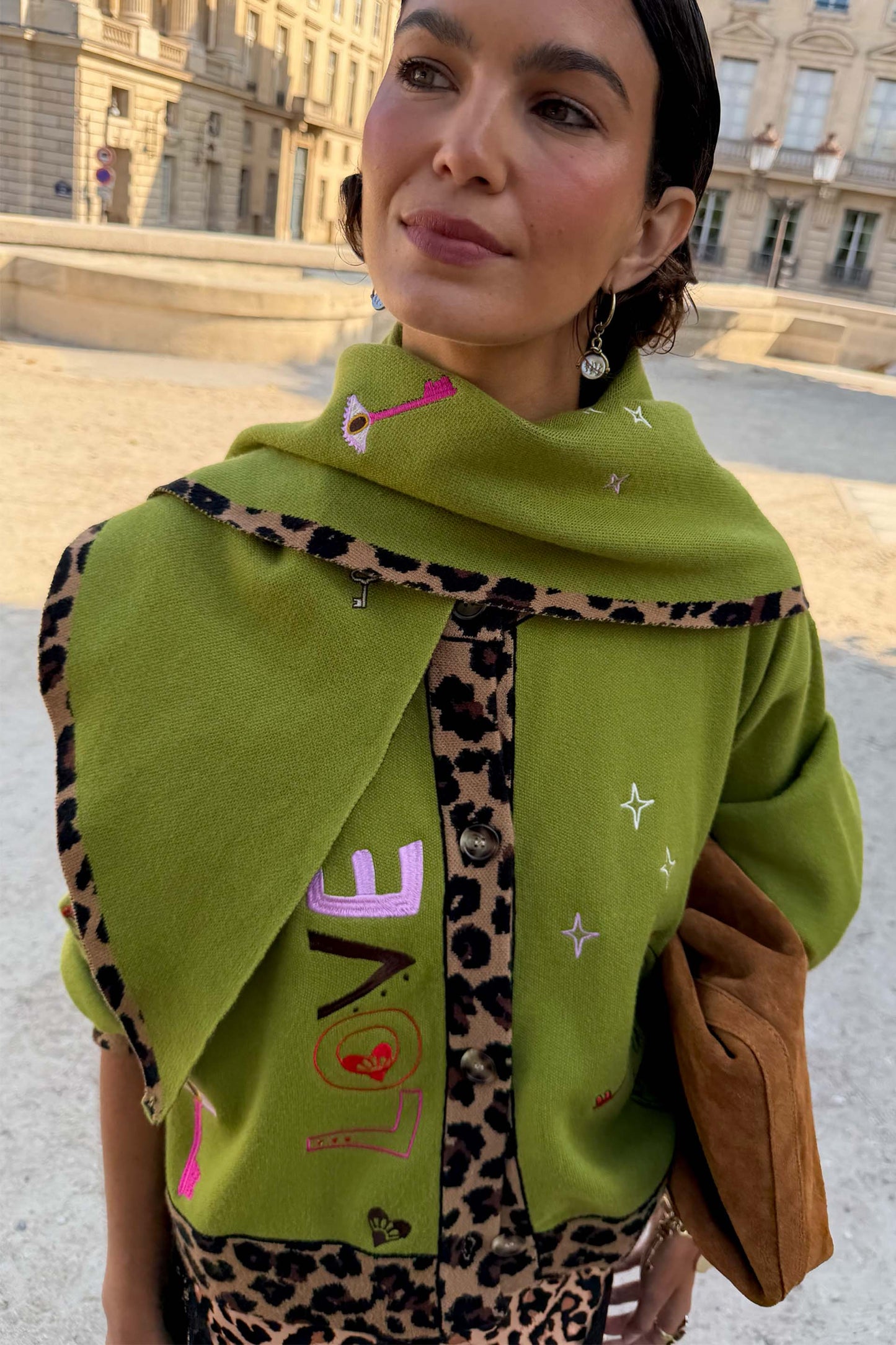 Olive green embroidered scarf with leopard trim.