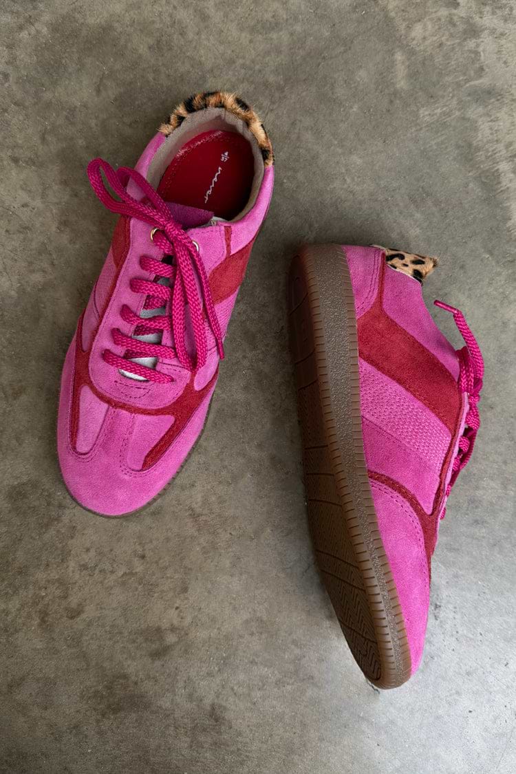 Pink trainers in mixed fuchsia and raspberry tones with tonal panel detailing, matching laces, leopard print heel tab, and gum sole