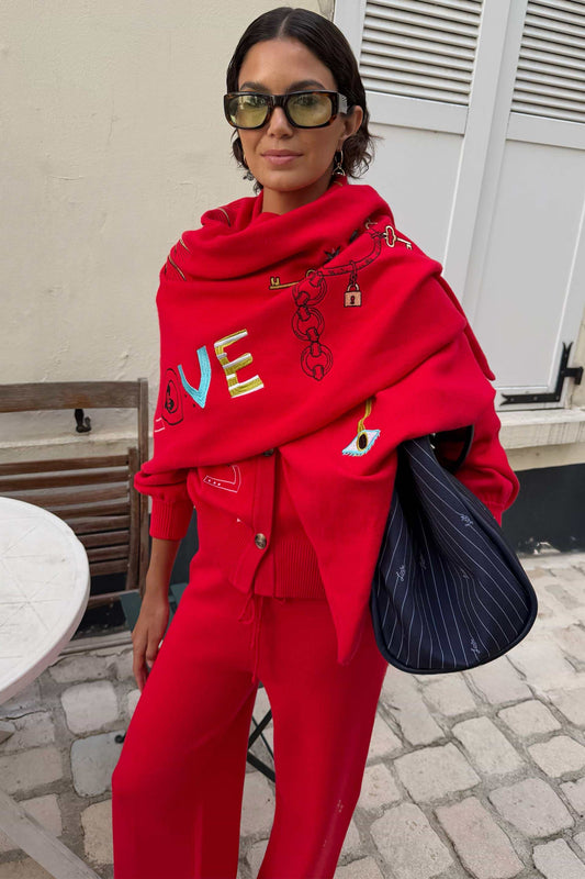 Red embroidered triangle scarf.