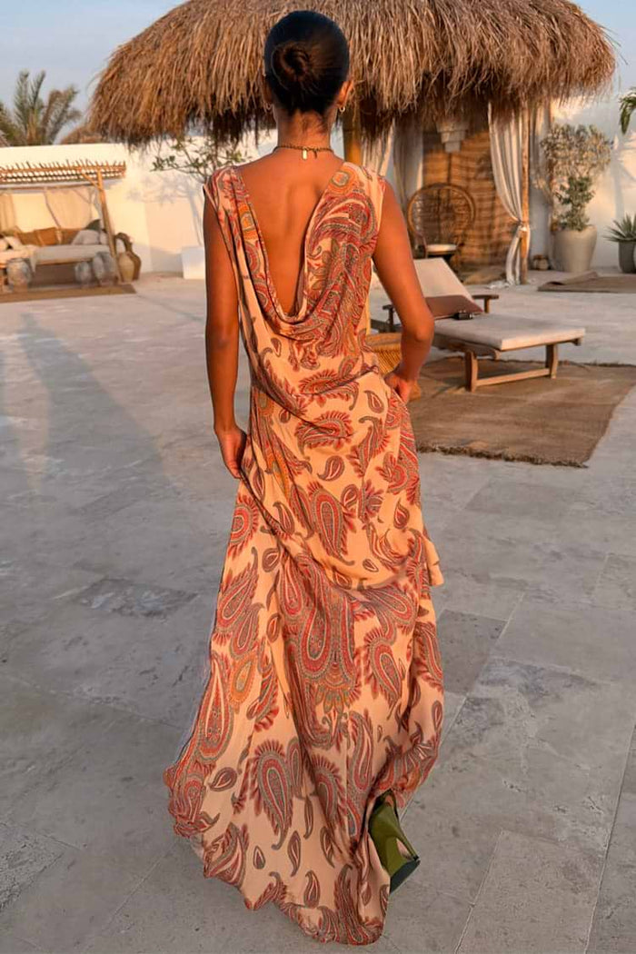 Warm beige and red paisley dress.