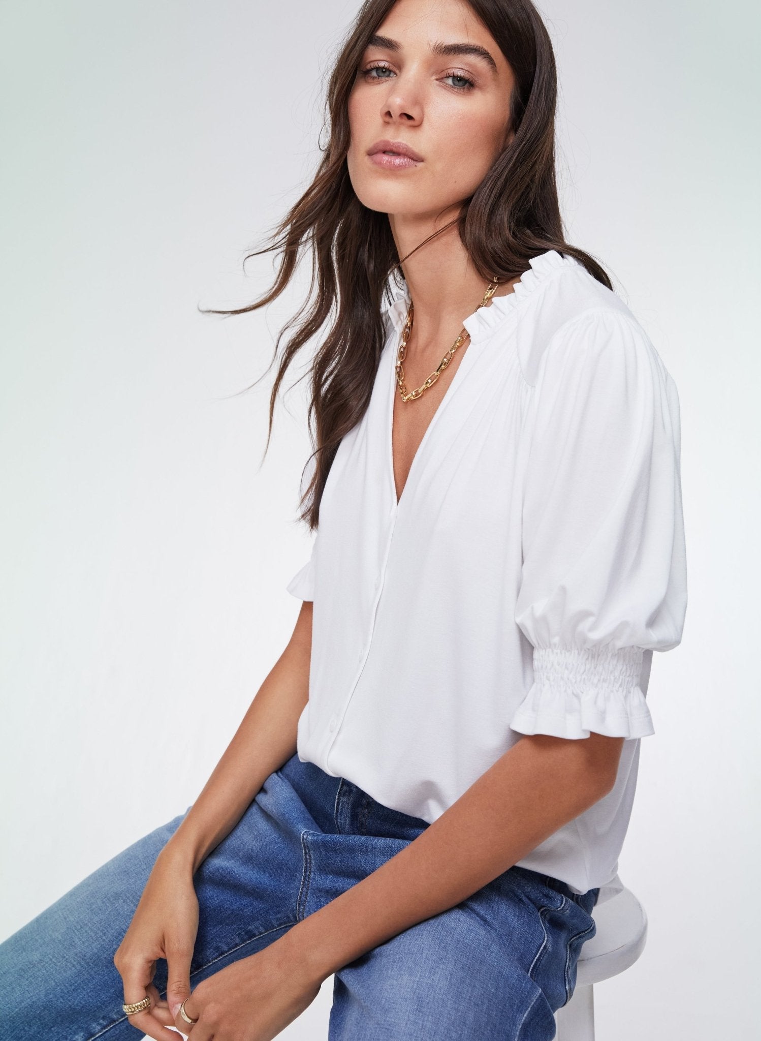 Pure white jersey short sleeve blouse with pie-crust collar.