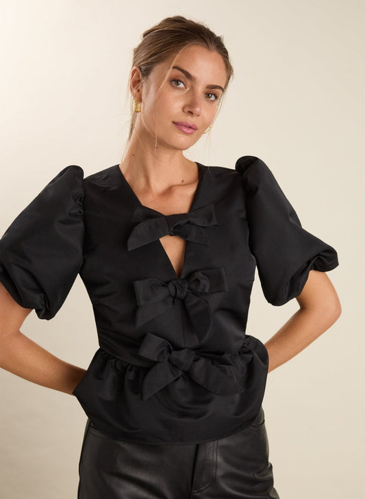 Black puff sleeve blouse with tie front.