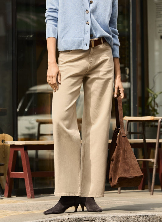 Sand coloured wide leg jeans.