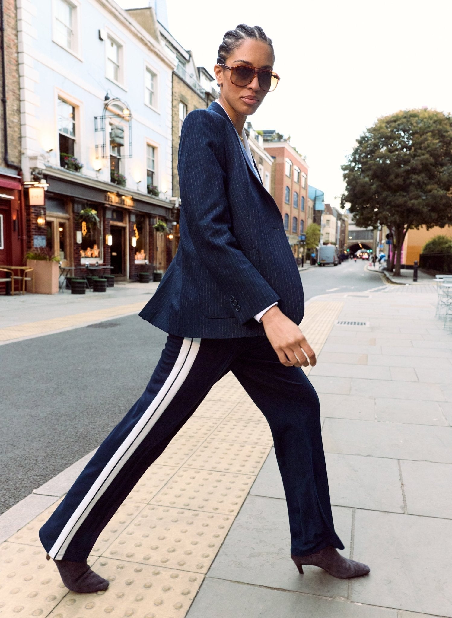 Navy blue trousers with white side stripe.
