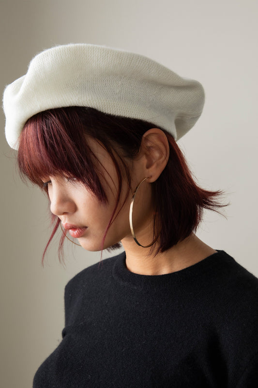 Soft white cashmere beret by Kiltane.