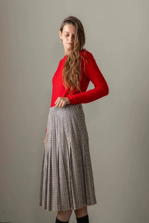 Bright red crewneck cashmere jumper.