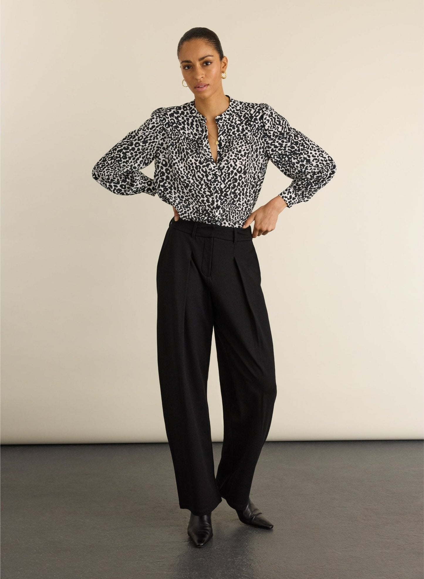 Black and white leopard print blouse.