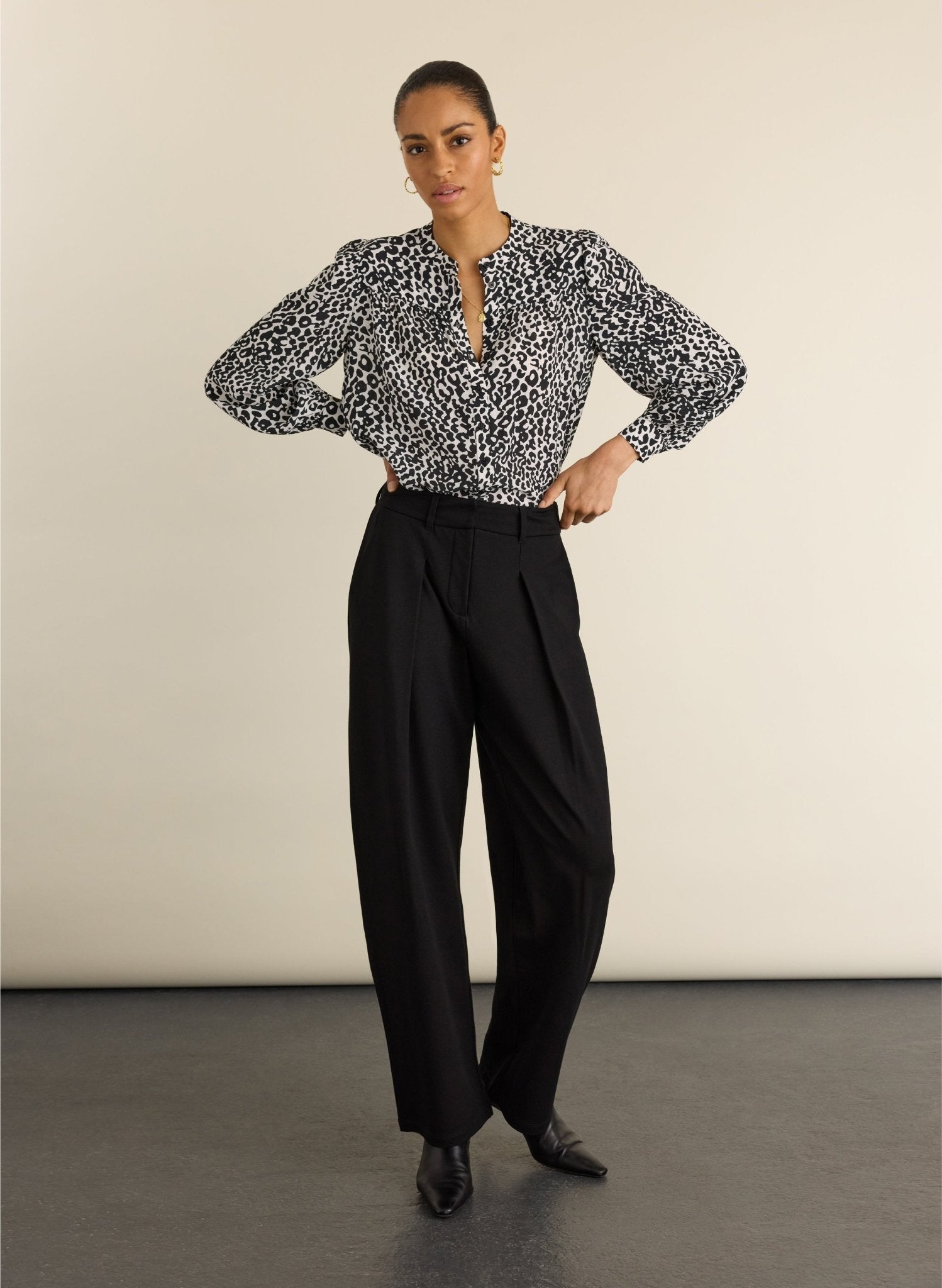Black and white leopard print blouse.
