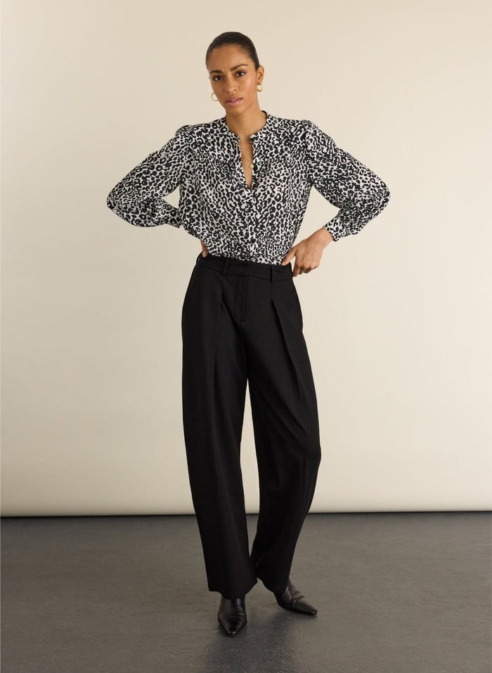 Black and white leopard print blouse.