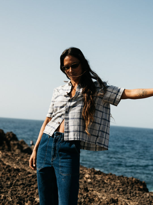 Soft navy and ecru checked organic cotton shirt.