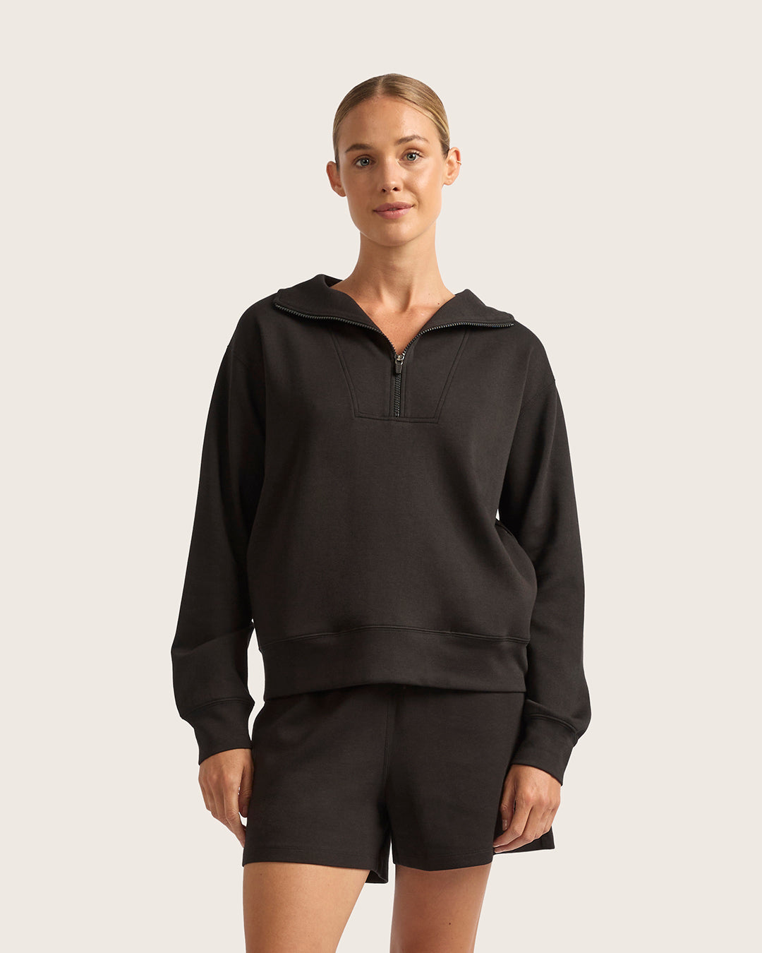 Black quarter zip bamboo sweater by Boody.