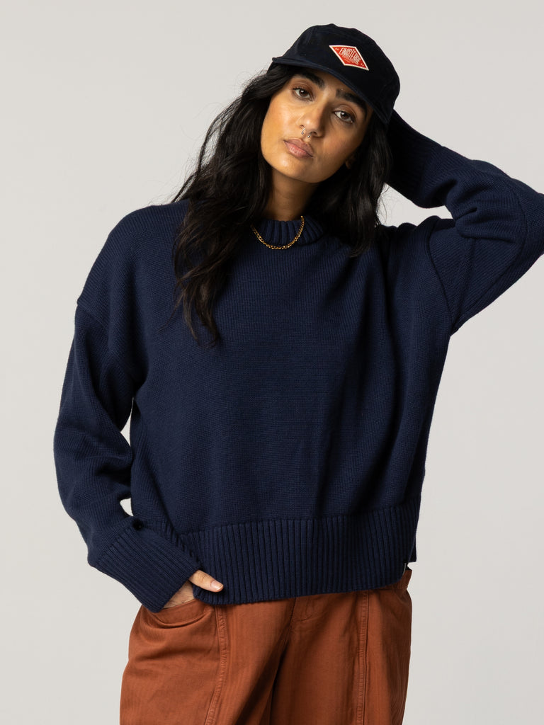 Navy blue merino and organic cotton fishermen's jumper.