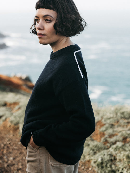 Navy blue contrast stripe wool blend round neck jumper.