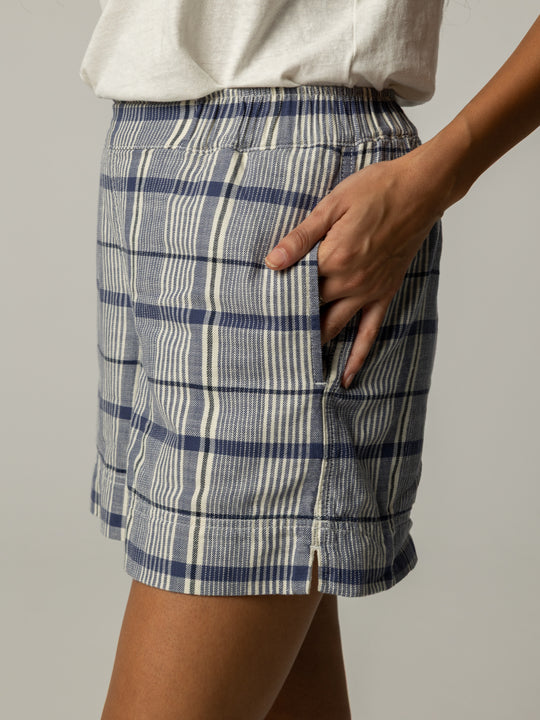 Soft navy and ecru checked shorts.