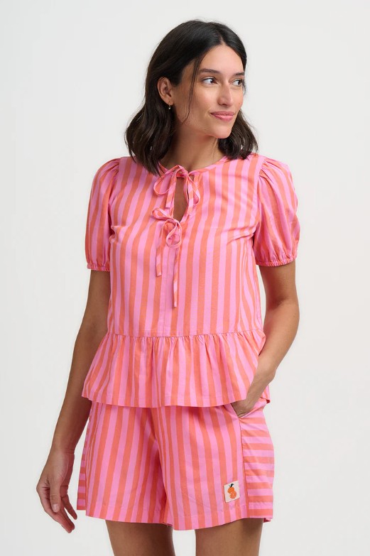 Pink striped tie neck blouse.